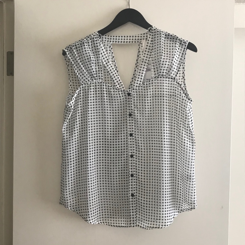 Sheer patterned sleeveless blouse